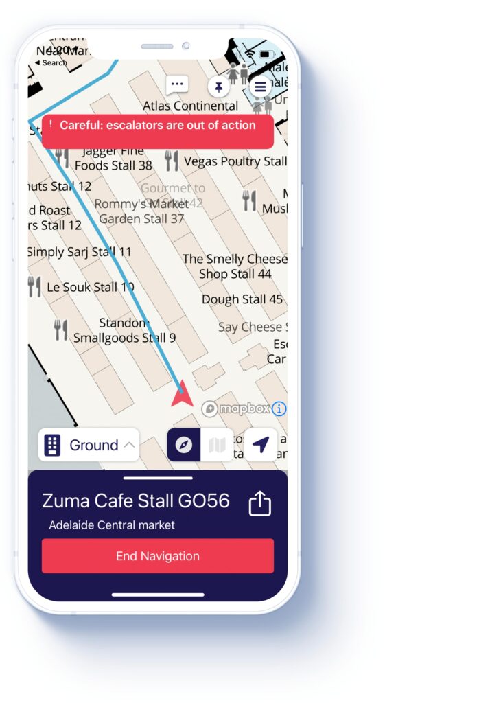 iPhone with BindiMaps open and navigating to cafe