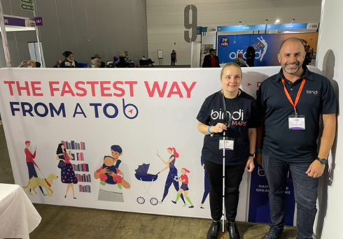 BindiMaps team at disability expo, with a banner behind saying, "The Fastest way from A to b".