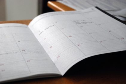 Calendar opened on a wooden desk